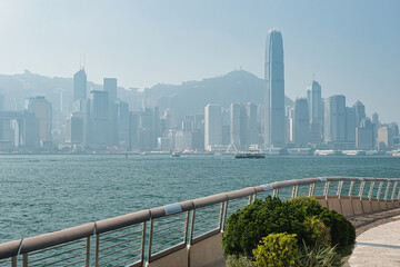 January 01, 2024: Buildings on Victoria Harbour, Hong Kong, China. People celebrating Chinese new year and 2024. 