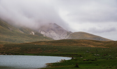 landscape inside Campo imperatore during an autumnal cloudy day, Parco nazionale del Gran Sasso, L'Aquila, Italy