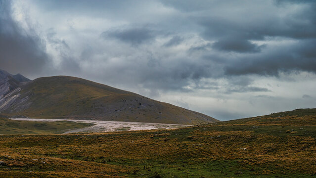landscape inside Campo imperatore during an autumnal cloudy day, Parco nazionale del Gran Sasso, L'Aquila, Italy