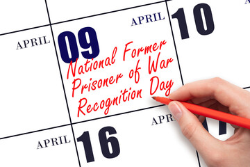 April 9. Hand writing text National Former Prisoner of War Recognition Day on calendar date. Save the date. - Powered by Adobe