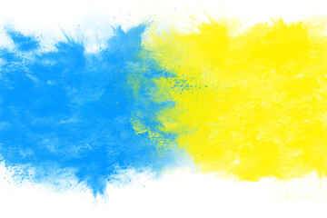 Acrylic dry paint splatter explosion of blue and yellow paint on a white background. Mixing colors....