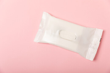 Packaging of wet wipes on background. An open pack of hand and body wipes. Mockup. A clean packet...
