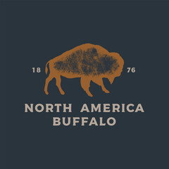 Hand drawing of American bison in retro engraving style. Buffalo in graphic vintage style. Vector logo template.