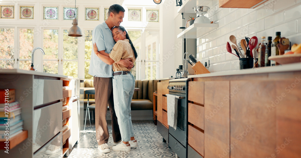 Wall mural Love, dance and a happy couple in a kitchen at home with happiness, care and romance. Young woman and a man together in an apartment to hug, relax and bond for quality time, security and commitment