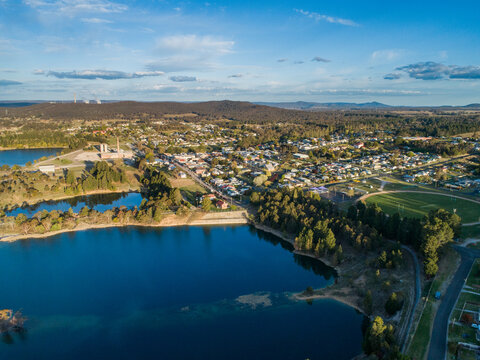 Aerial view over old quarry now a lake and Portland Cement Works 
