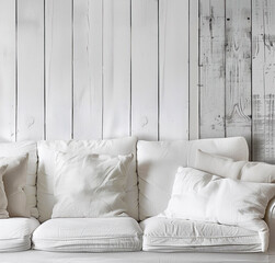 Template of sofa on a white wooden wall, country home living room closeup. Interior mockup with clean walls for pictures, posters, paintings, sculptures, and other wall art.