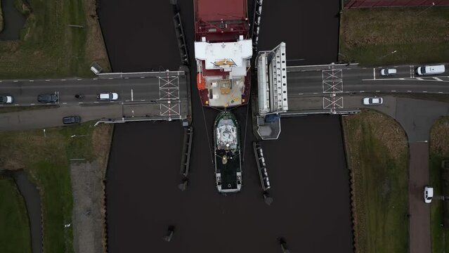 Aerial video of cargo ships in Appingedam Netherlands