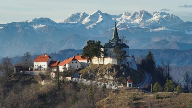 Pilgrimage site Sveta gora in Zasavje, with Kamnik-Savinja Alps in the background, Slovenia