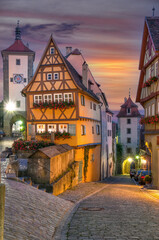 Fototapeta na wymiar the famous Place in Rothenburg ob der Tauber called Ploenlein at Night,Franconia,Bavaria,Germany