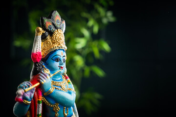 Beautiful sculpture of Lord Krishna , Vishu festival background