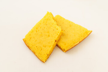 Corn tortillas and ingredients on white background