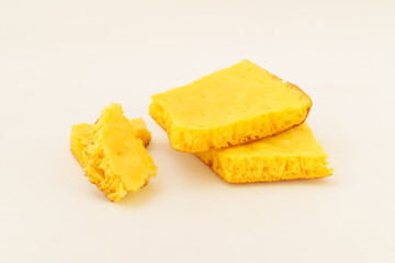 Corn tortillas and ingredients on white background