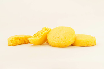 Corn tortillas and ingredients on white background