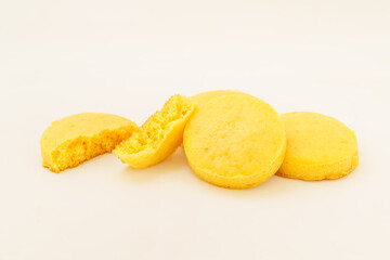 Corn tortillas and ingredients on white background