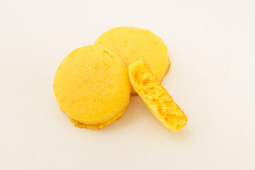 Corn tortillas and ingredients on white background