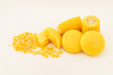 Corn tortillas and ingredients on white background