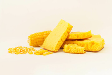 Corn tortillas and ingredients on white background