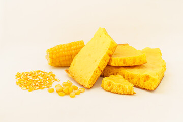 Corn tortillas and ingredients on white background