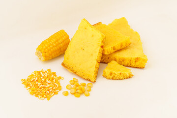 Corn tortillas and ingredients on white background