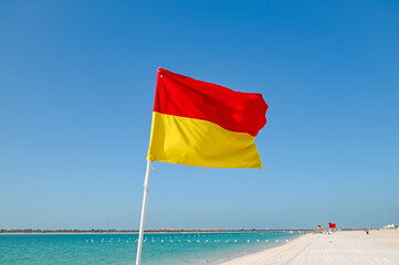 Red and Yellow lifeguard beach flag