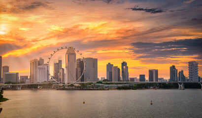 Singapore city skyline of business district downtown at sunset.