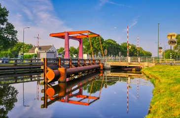 Foto auf Leinwand Oranjelaan drawbridge, village of Beek en Donk, The Netherlands. © Alex de Haas