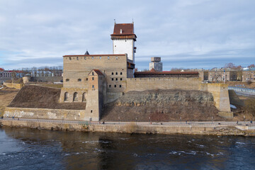 Medieval Herman Castle on the border of Estonia and Russia on a March day. Narva, Estonia - 779929784