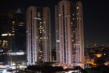 Buildings at night in Manila on march 28, 2024