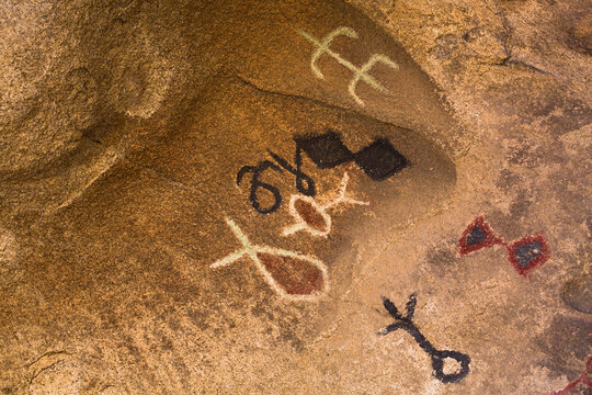 Ancient petroglyphs painted on rocks in Joshua Tree National Park
