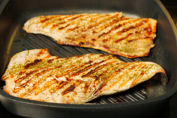 Grilled Salmon Fillets Perfectly Charred on the Grill. Selective focus