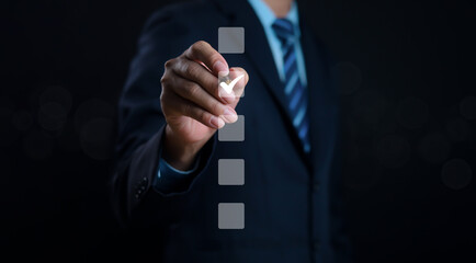 Businessman checklist concept as clipboard document checklist form on the virtual screen Use your hands or a pen to check the correct control gaps and check the quality standards of the work.