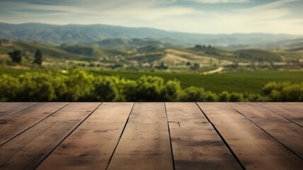 The empty wooden brown table top with blur background of Napa hill landscape. Exuberant image....
