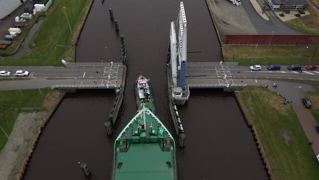 Aerial video of cargo ships in Appingedam Netherlands