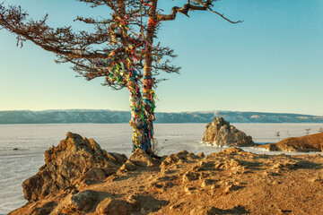 Winter landscape on Baikal lake with Shamanka rock, Olkhon island, Siberia, Russia.