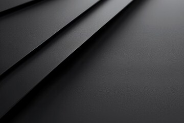 A smooth matte black surface with a subtle gradient