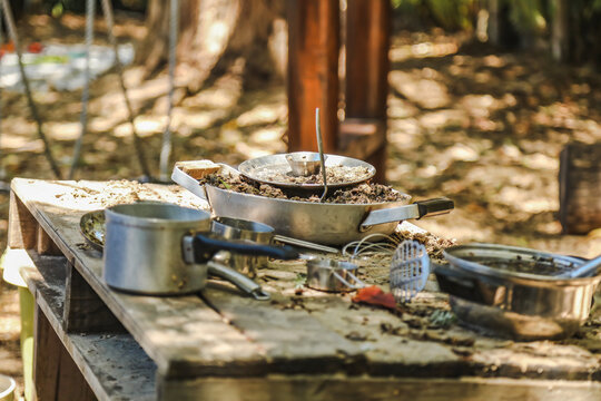 Mud kitchen in tropical preschool garden. Kindergarten yard in Australia.