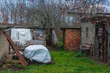 courtyard of a one-story peasant house in a village in the south of Russia on a sunny day in early spring