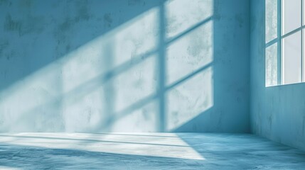 light blue background Shadows and light from the window on the cement wall