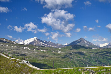 People hiking on the Stubnerkogel mountain in Bad Gastein Austria - 779968547
