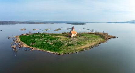 Musov Island in South Moravia, Czech Republic, with medieval Gothic saint Linhart (Leonard) church, now abandoned, after the village was flooded by the Nowe Mlyny (New Mills) dam lake in the eighties - 779969581