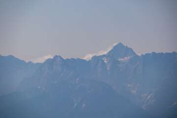 Scenic view from summit Dobratsch on Julian Alps and Karawanks mountain ranges in Carinthia,...