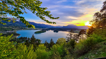 Panoramic sunset view on Lake Faak from Taborhoehe in Carinthia, Austria, Europe. Surrounded by...
