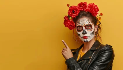 Poster A woman with sugar skull face art and a red flower wreath on her head dressed in a black leather jacket © MdImam