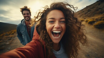 Joyful Young Couple Taking a Selfie During a Hiking Adventure