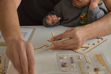 close up of a happy parent playing with kid