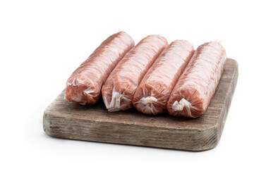 Raw pork sausages isolated on white background