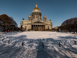 Snow-covered Park in front of St. Isaac's Cathedral in St. Petersburg - Russia in the spring sun