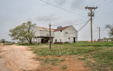 Abandoned buildings of an old cotton gin in the village of Loop, Texas, USA