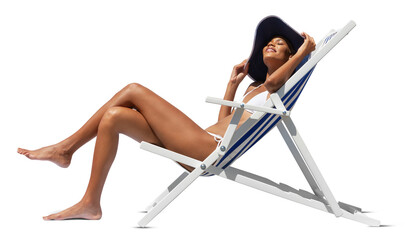 Happy woman at the beach on beach deck chair, sunbathing, wearing sun hat, isolated in the white background, concept a summer beach holiday, online shopping, booking travel, and resorts accommodations