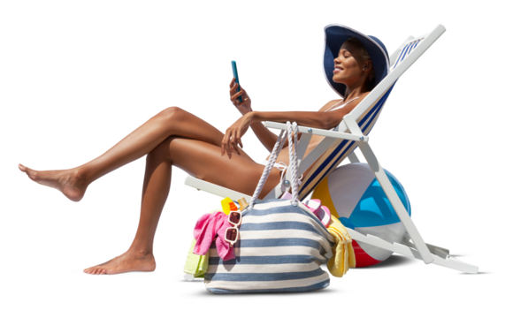 Happy woman at the beach on deck chair, sunbathing, uses the mobile phone, isolated in the white background, concept a summer beach holiday, online shopping, booking travel, and resorts accommodations